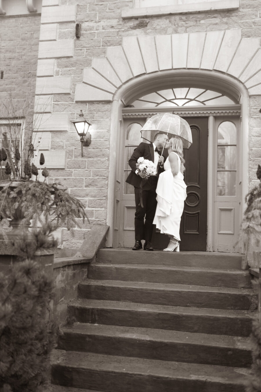 strathmere bride and groom on a rainy day